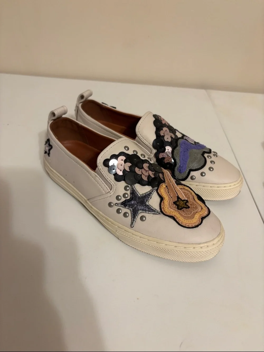 Coach Cream Slip-On Sneakers with Multicolor Sequin Guitar & Star Patches
